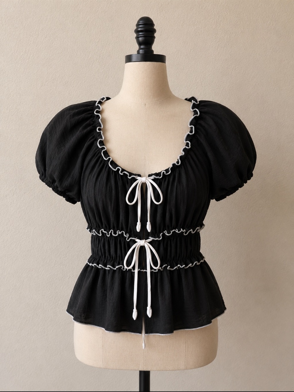 Discreet Black Puff Sleeve Peplum Top with White Trim